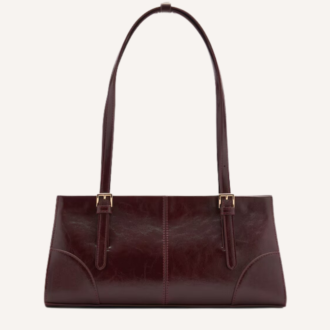 As the crisp air of fall settles in, nothing completes a seasonal wardrobe like chic burgundy bags.