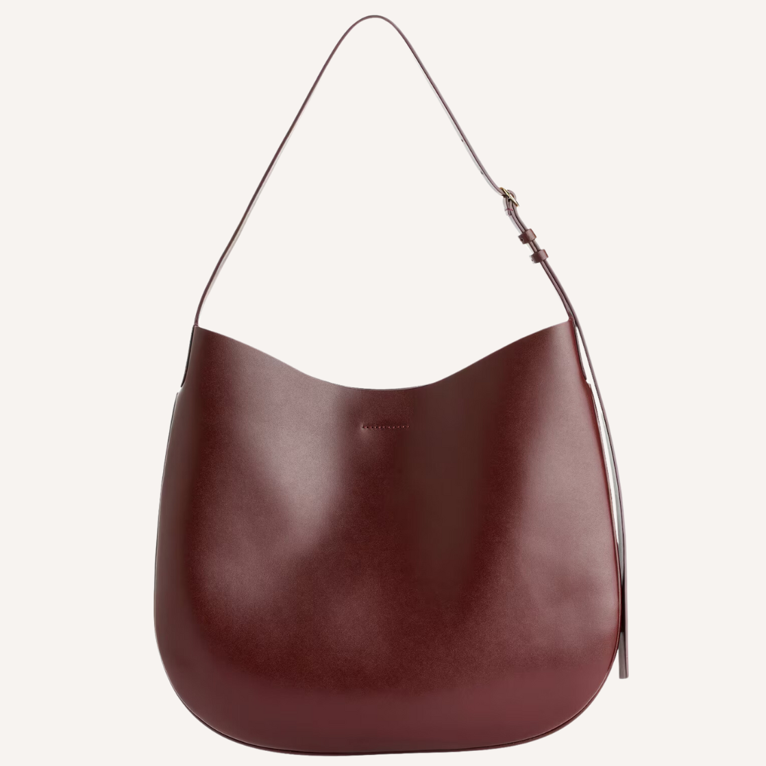 As the crisp air of fall settles in, nothing completes a seasonal wardrobe like chic burgundy bags.