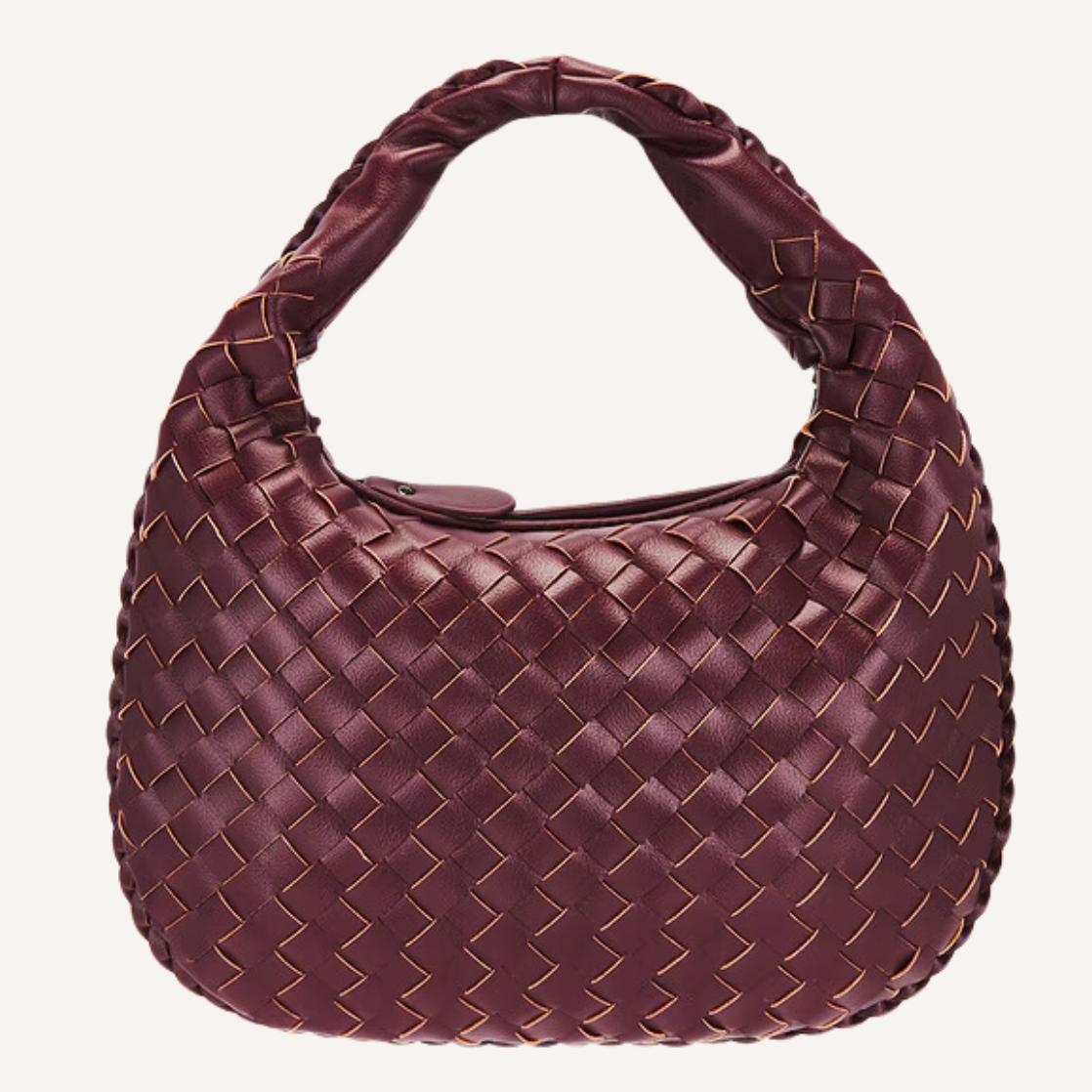 As the crisp air of fall settles in, nothing completes a seasonal wardrobe like chic burgundy bags.