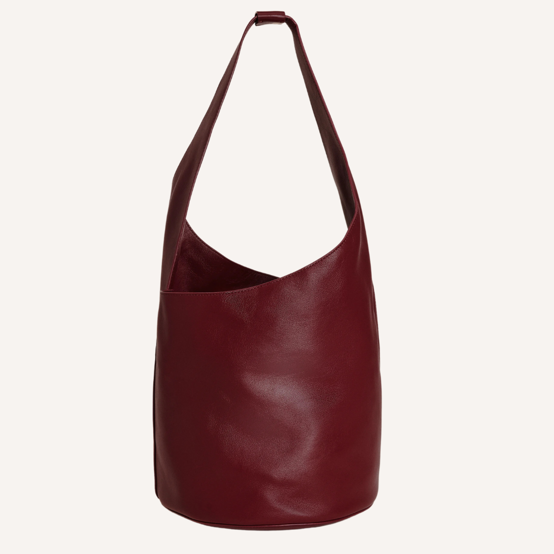 As the crisp air of fall settles in, nothing completes a seasonal wardrobe like chic burgundy bags.