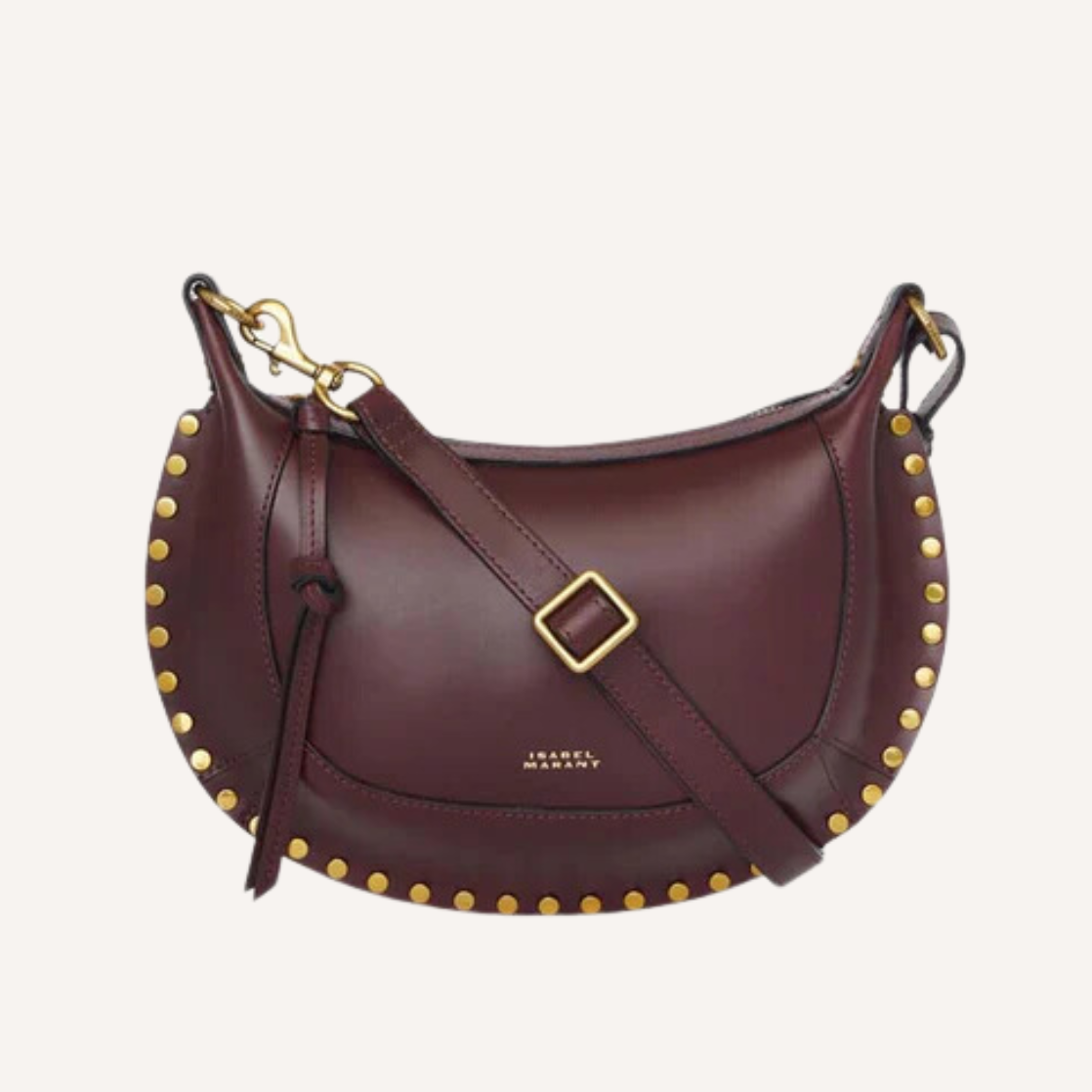 As the crisp air of fall settles in, nothing completes a seasonal wardrobe like chic burgundy bags.