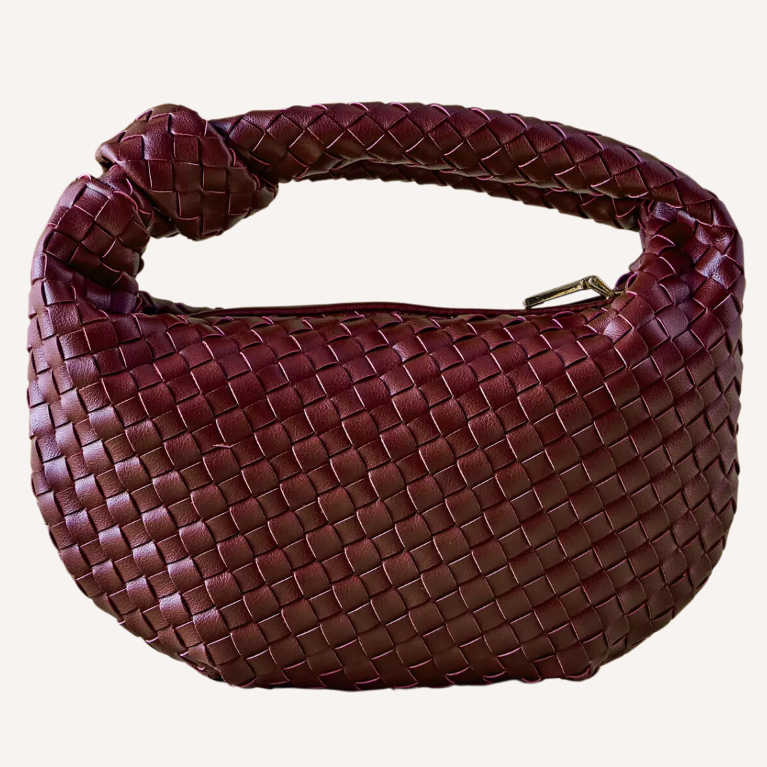 As the crisp air of fall settles in, nothing completes a seasonal wardrobe like chic burgundy bags.