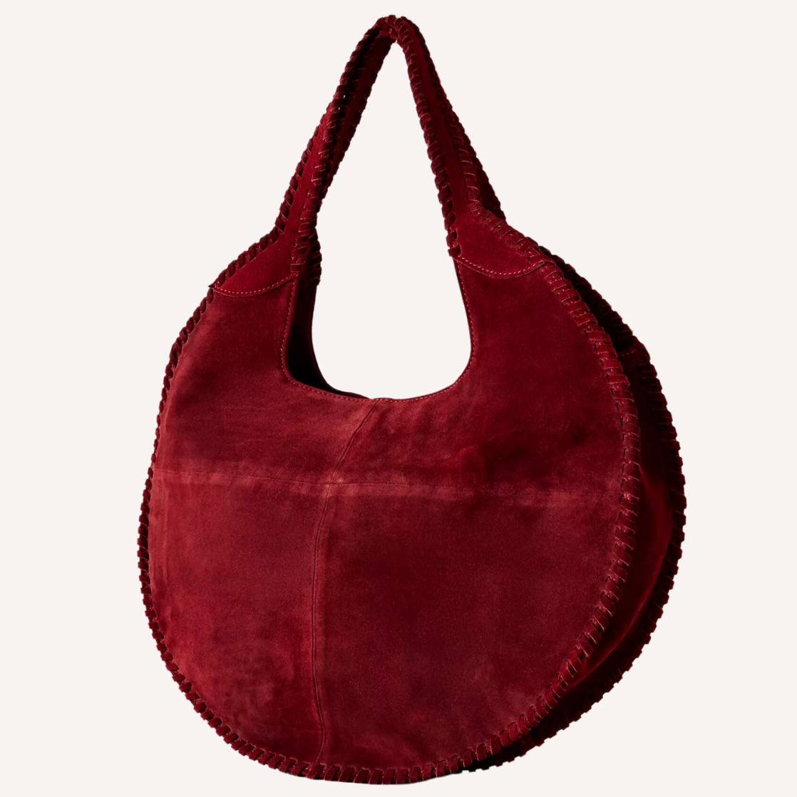 As the crisp air of fall settles in, nothing completes a seasonal wardrobe like chic burgundy bags.