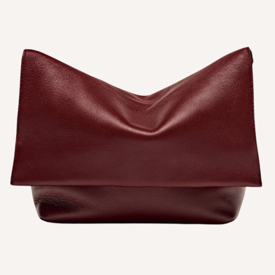 As the crisp air of fall settles in, nothing completes a seasonal wardrobe like chic burgundy bags.