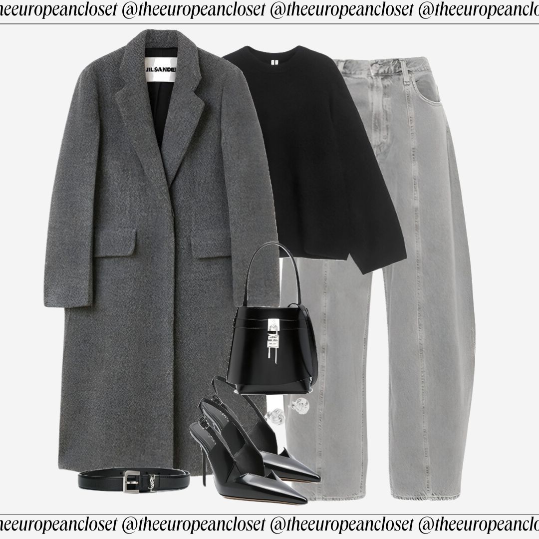 Flat lay of a gray Jil Sander coat, black top, gray jeans, black heels, a black handbag, and a belt, styled on a light background. Text overlay reads "theeuropeancloset" and "JIL SANDER."